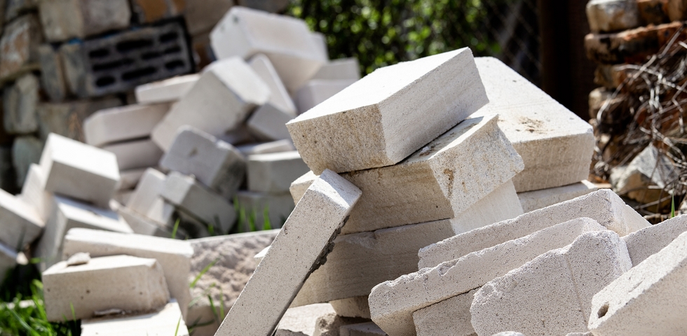 Removing the post construction debris will require either garbage bags or dumpsters. 