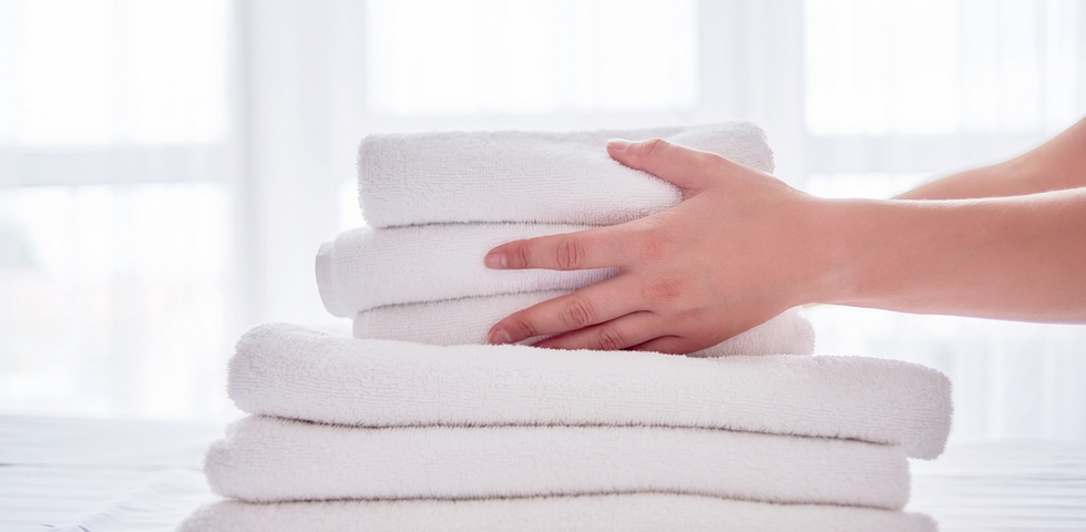 Replace the towels and bathmats.